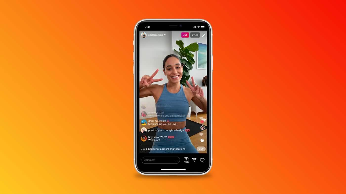 A view of an Instagram Live on the on a phone, where a fitness influencer smiles at the camera